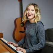 Woman enjoying practising piano