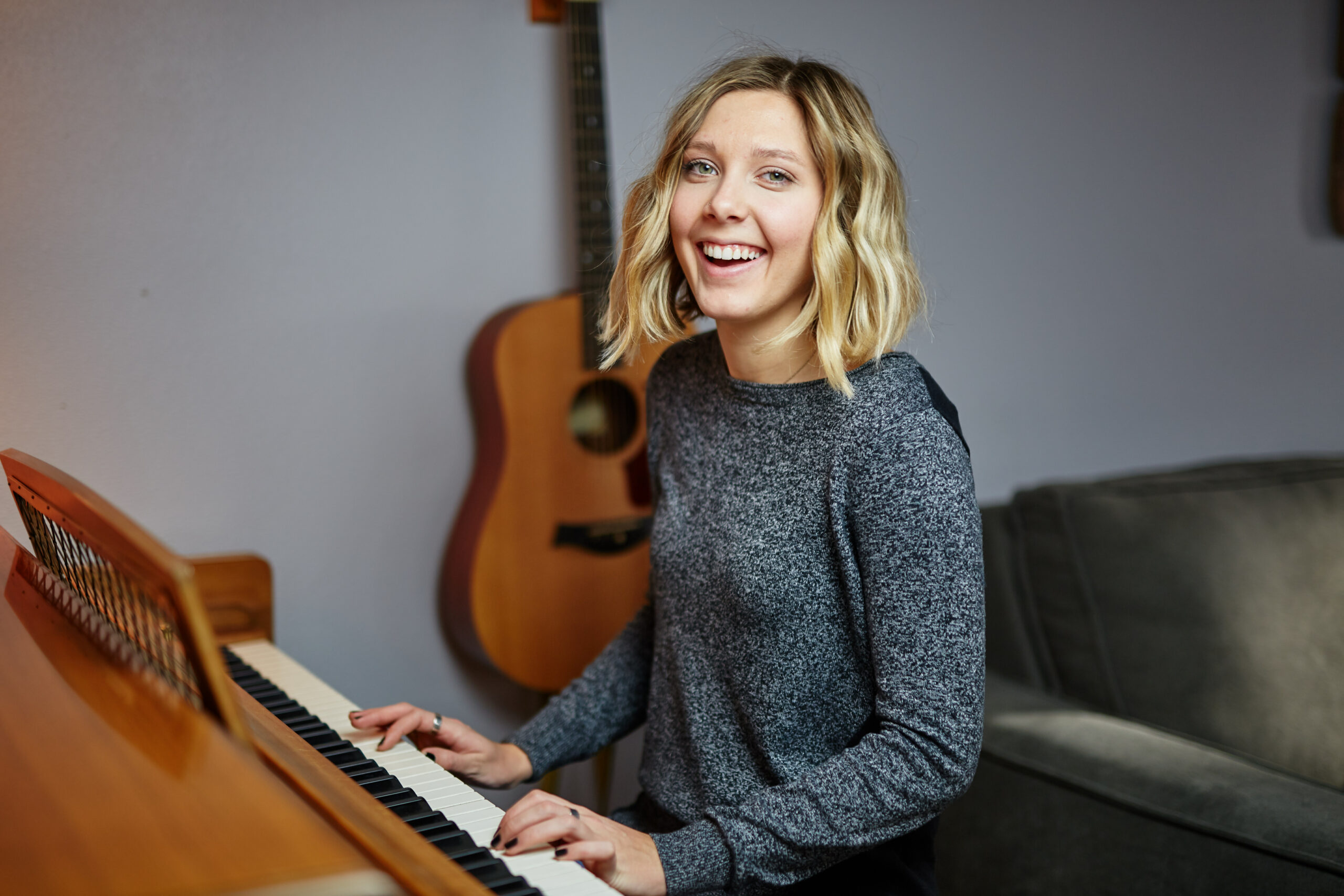 Woman enjoying practising piano