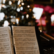 Music on a piano at Christmas time.