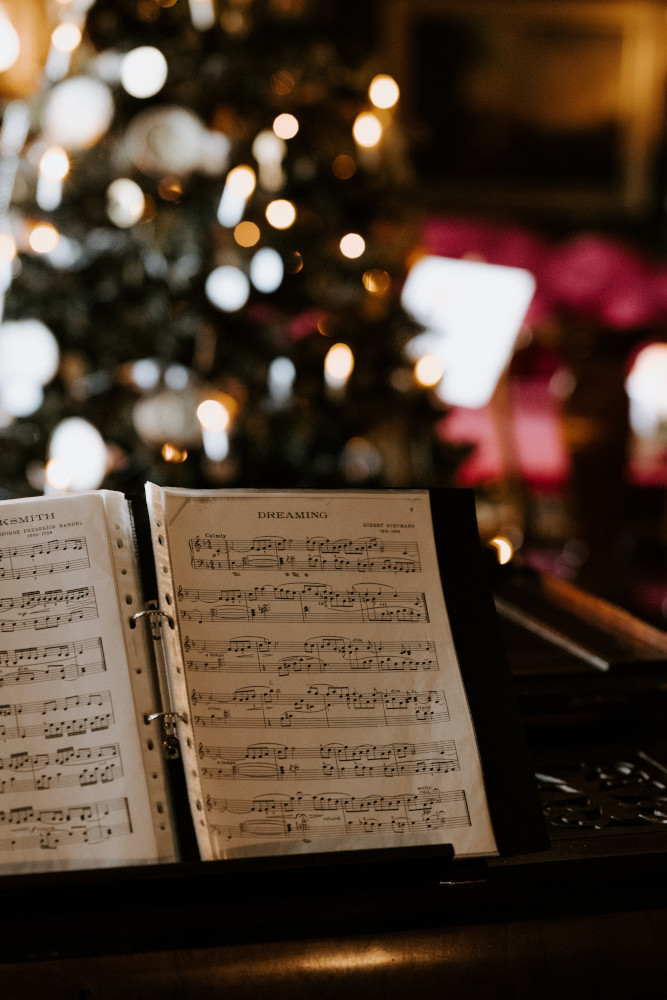 Music on a piano at Christmas time.