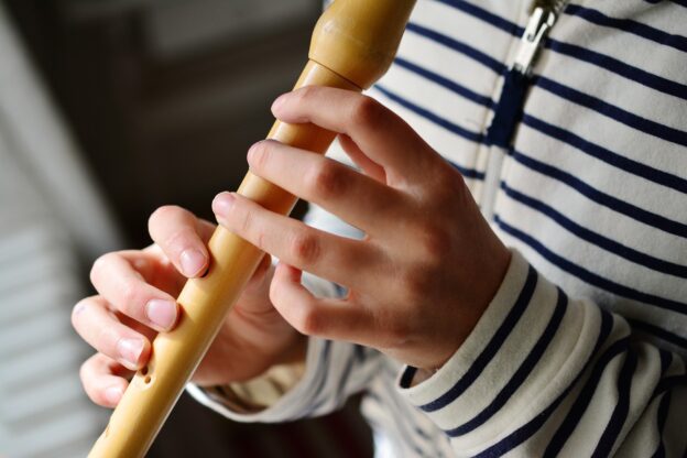 Person playing recorder